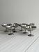 8 very large stainless steel footed bowls