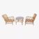 Vintage rattan garden furniture with cushions.
