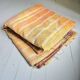 Fabric or plaid. old bed cover recycled and assembled worn deliberately