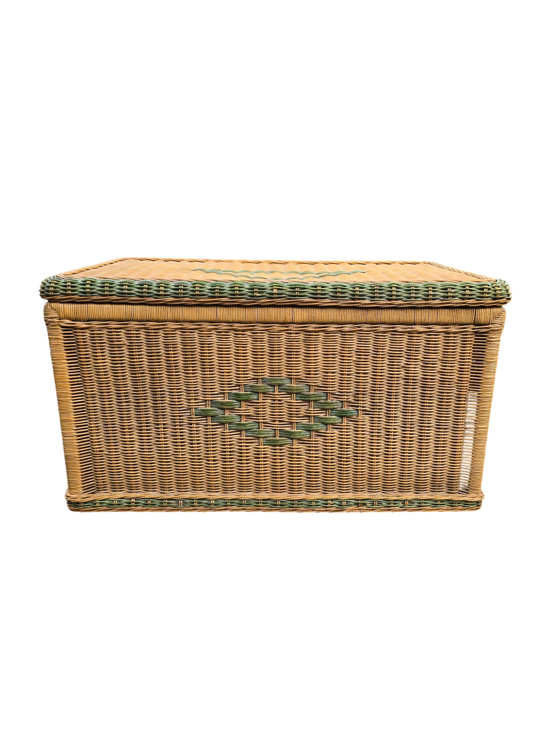 Large vintage wicker chest with green decoration.