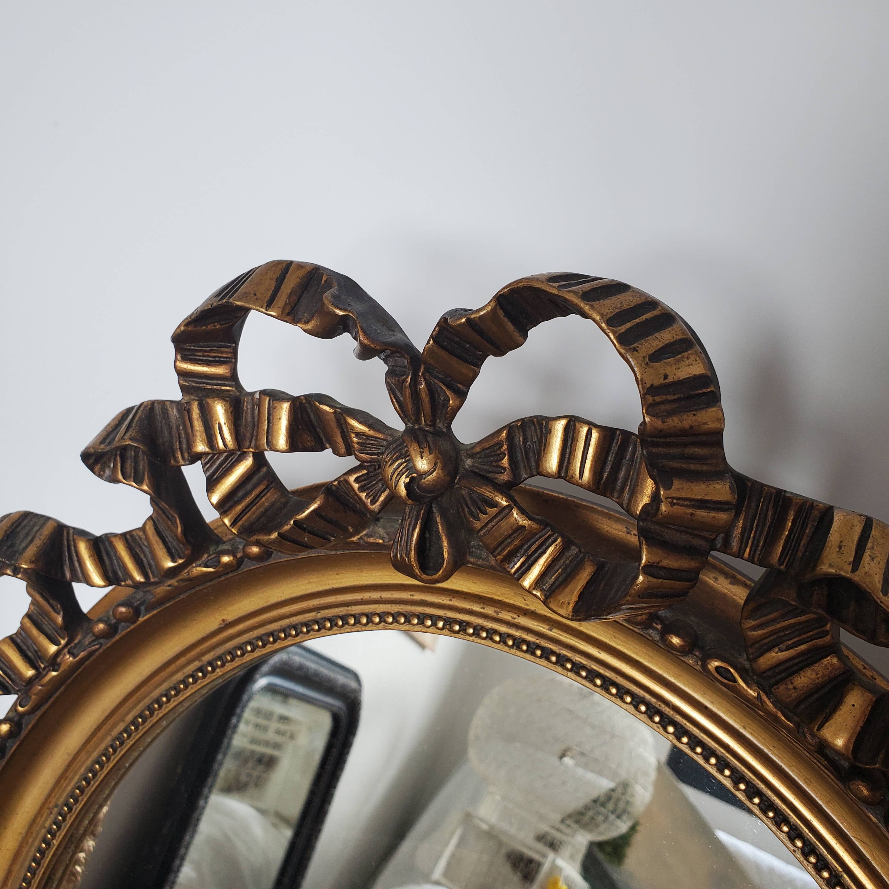 Louis XVI oval mirror with love knot and ribbon