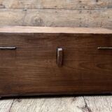 Teak chest from Burma with carved rosettes.