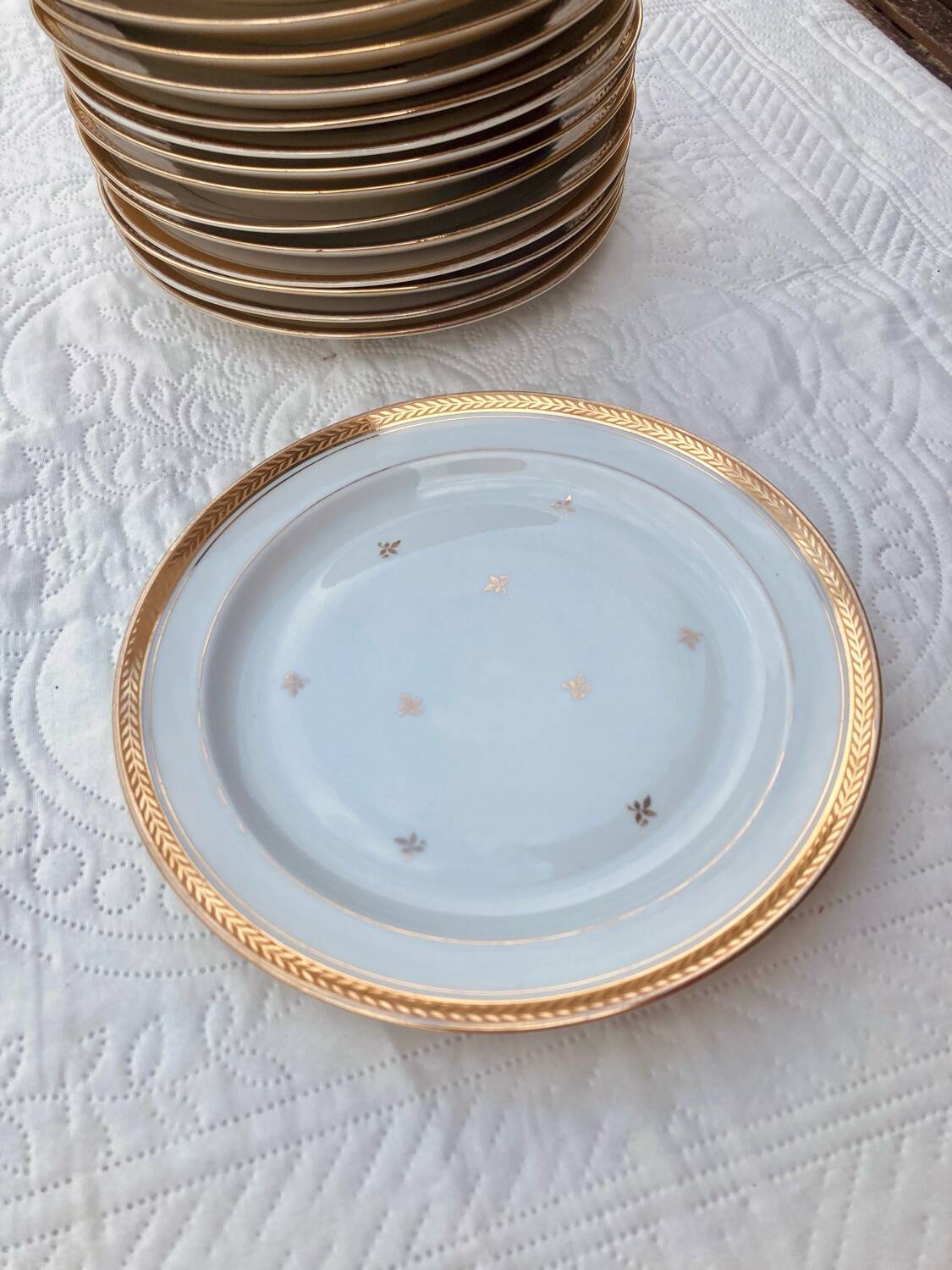 Set of golden Limoges plates
