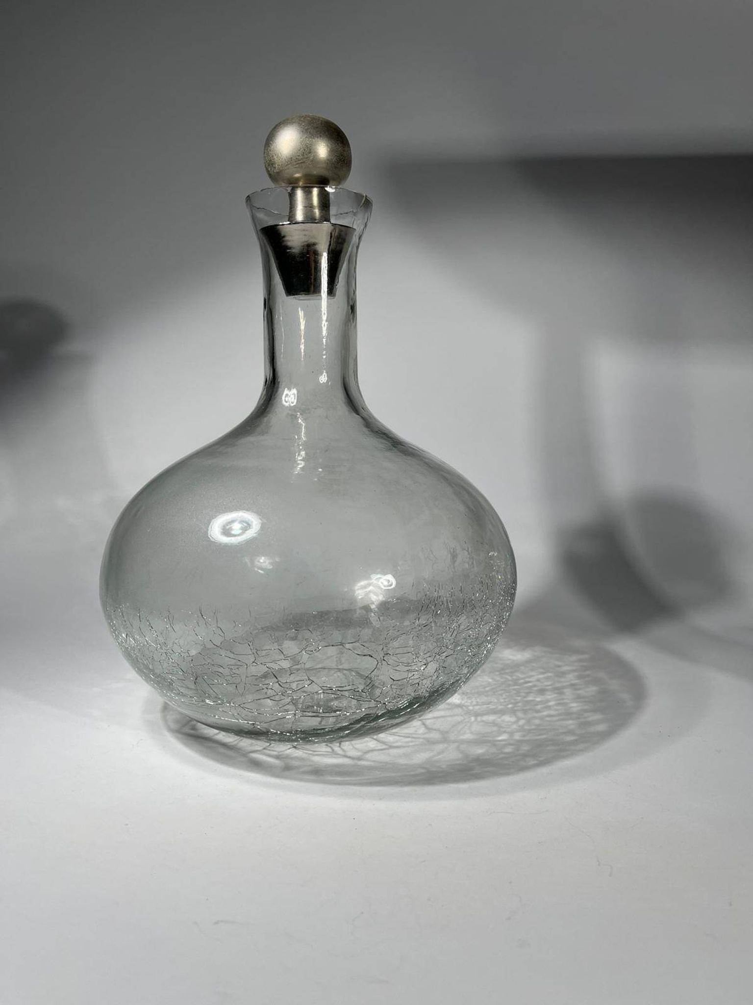 vintage cracked glass carafe with metal stopper