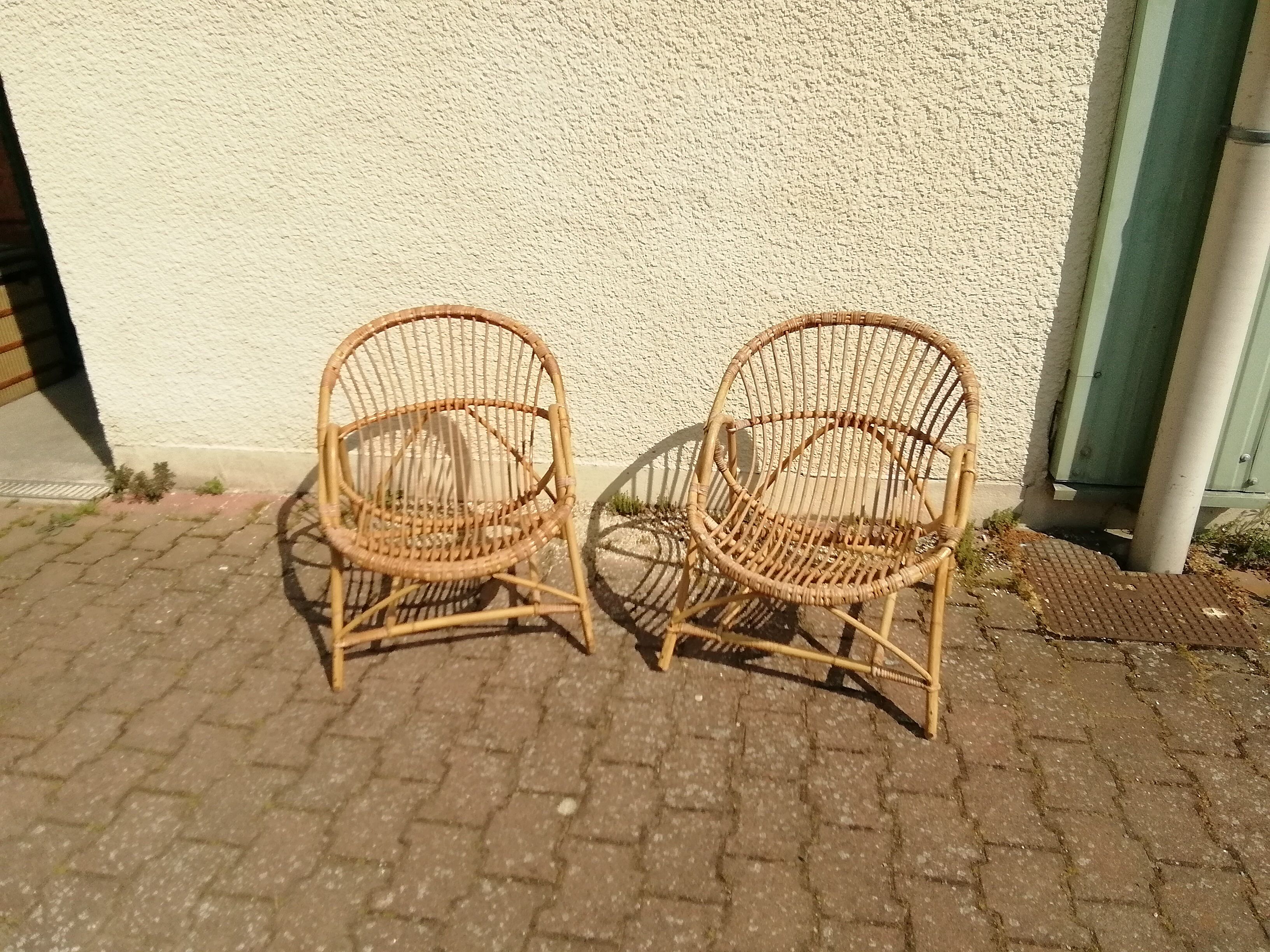 Vintage rattan armchair pair