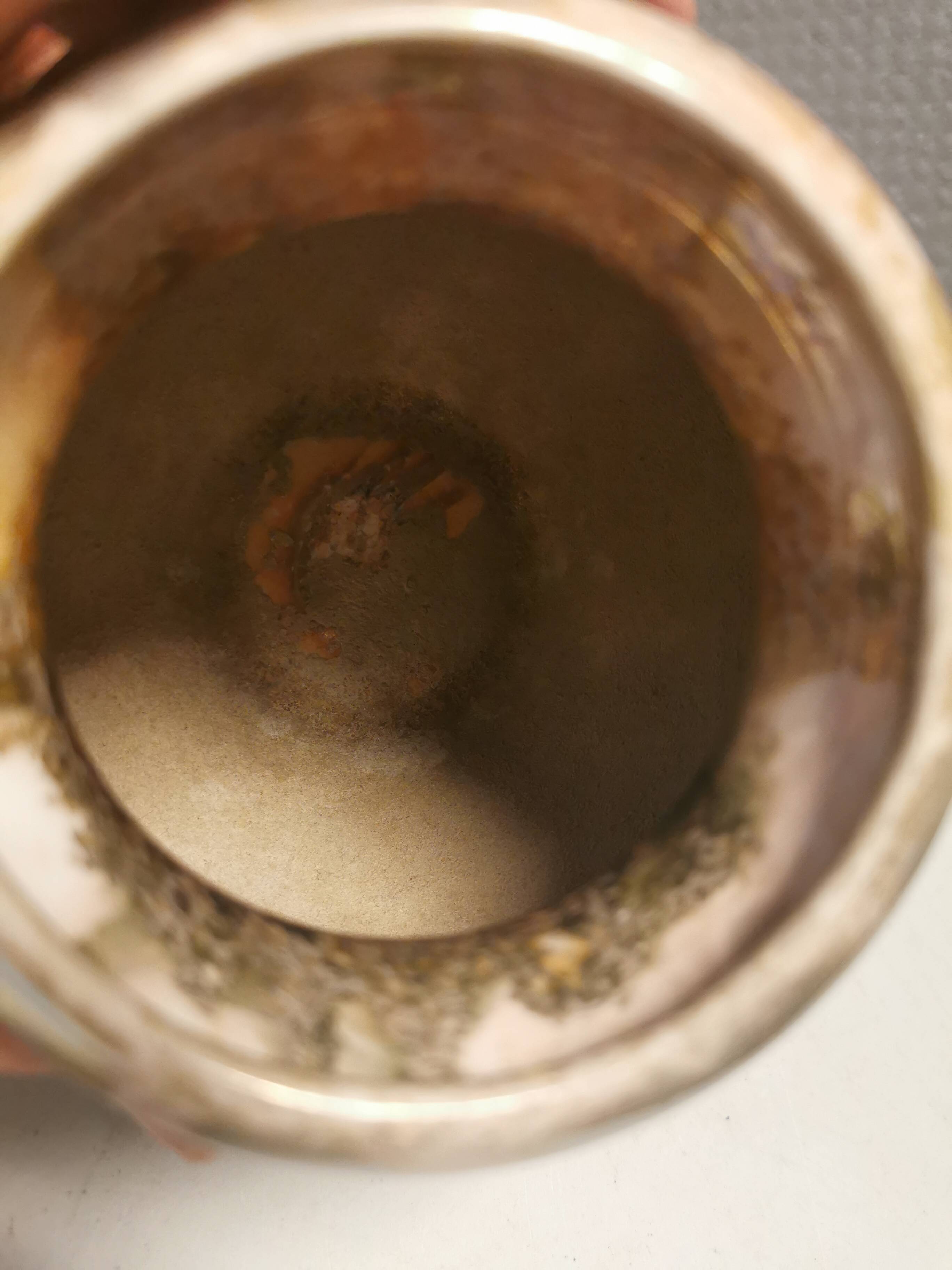 A set from Finnish Arabia, consisting of an Art Deco vase and matching dish, marbled lustre glaze.