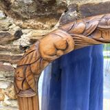 Beveled art deco mirror, carved wood