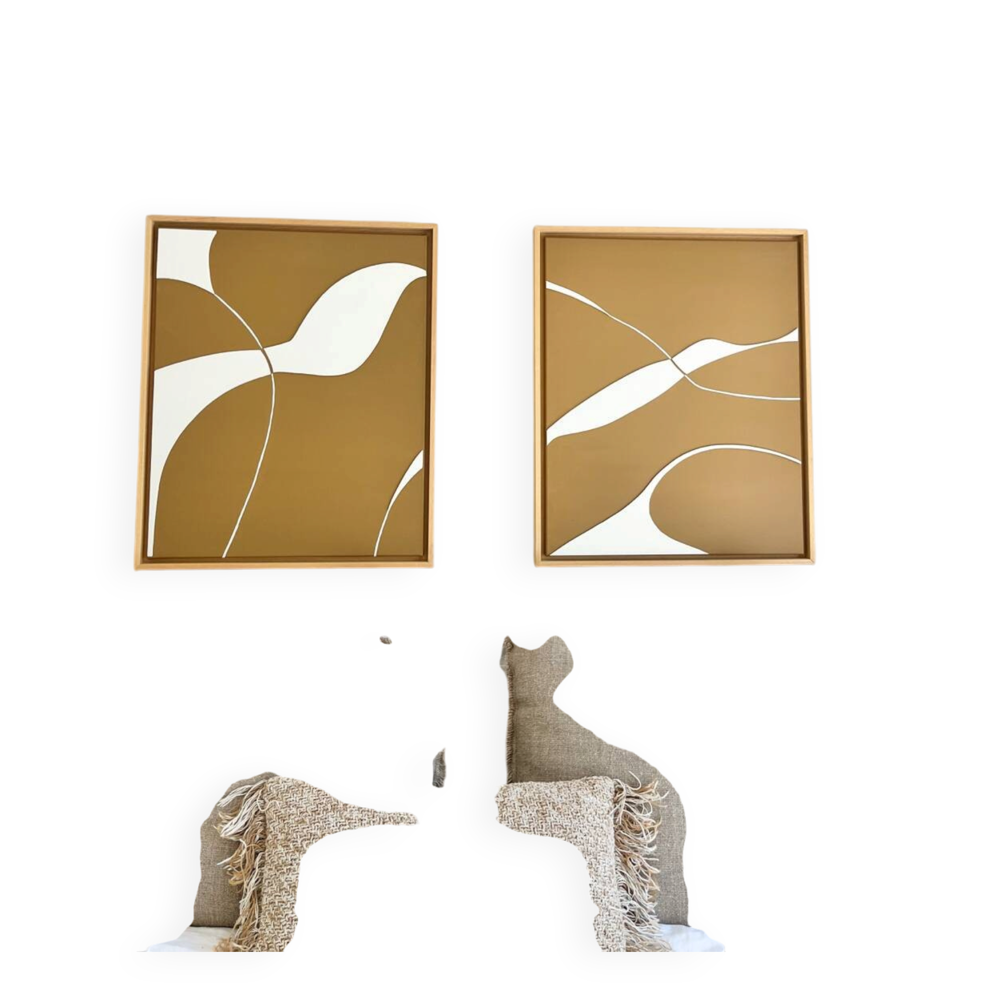 Diptych relief panels with a brown camel and cream background.