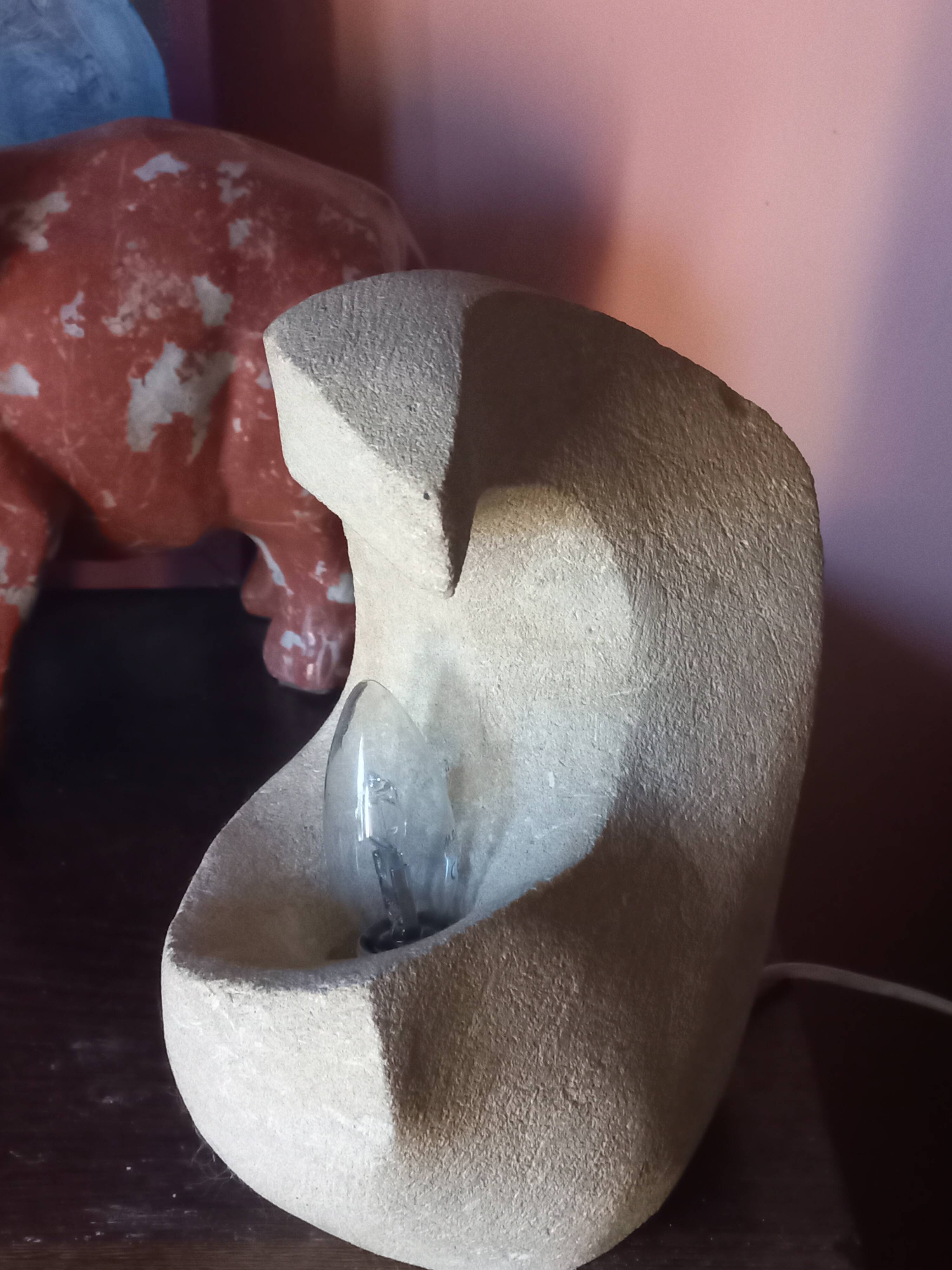 Sculpted stone lamp from the 1970s, signed.