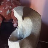 Sculpted stone lamp from the 1970s, signed.