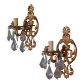 Antique wall sconces in Rococo style made of bronze and crystal, 20th century.