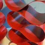 Pair of red metal bottle holders from the 80s