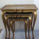 Set of three nesting tables in gilded wood in Florentine style Hollywo.