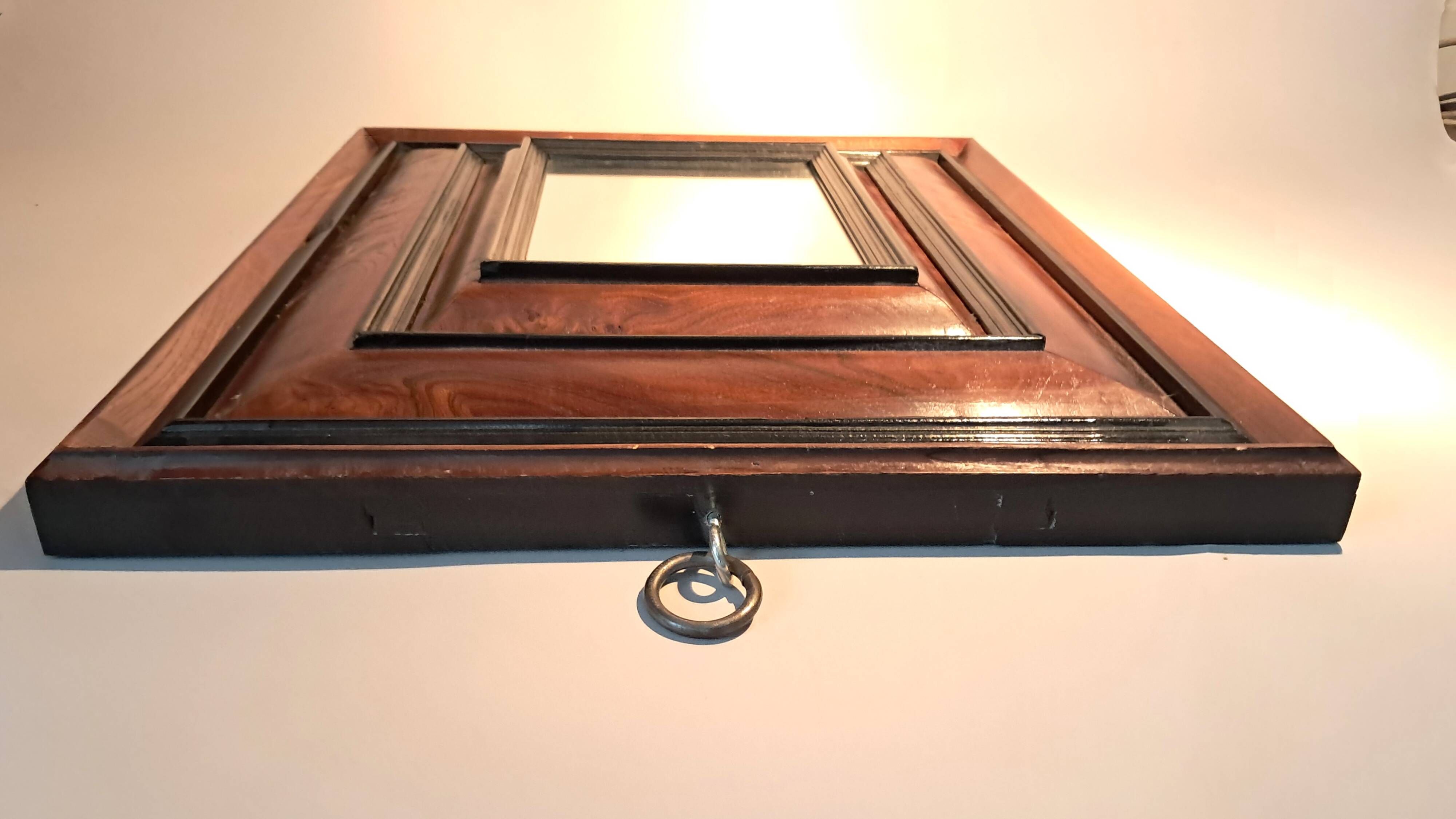 High period style mirror in solid wood from the early 20th century.