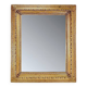 Large gilded wood and stucco mirror with foliage