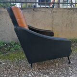 Paire de fauteuils en simili cuir