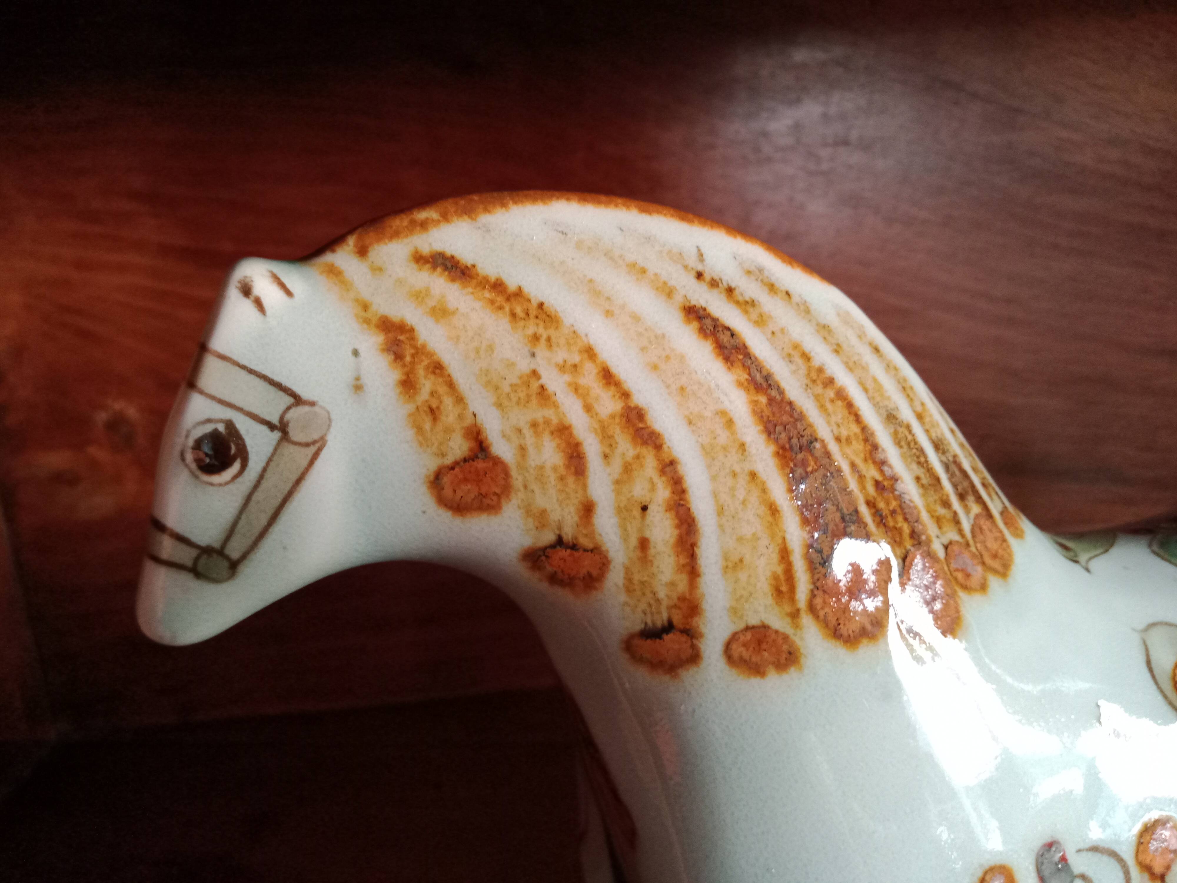 Ken edwards pottery - stylized horse decorated with butterfly flowers bird