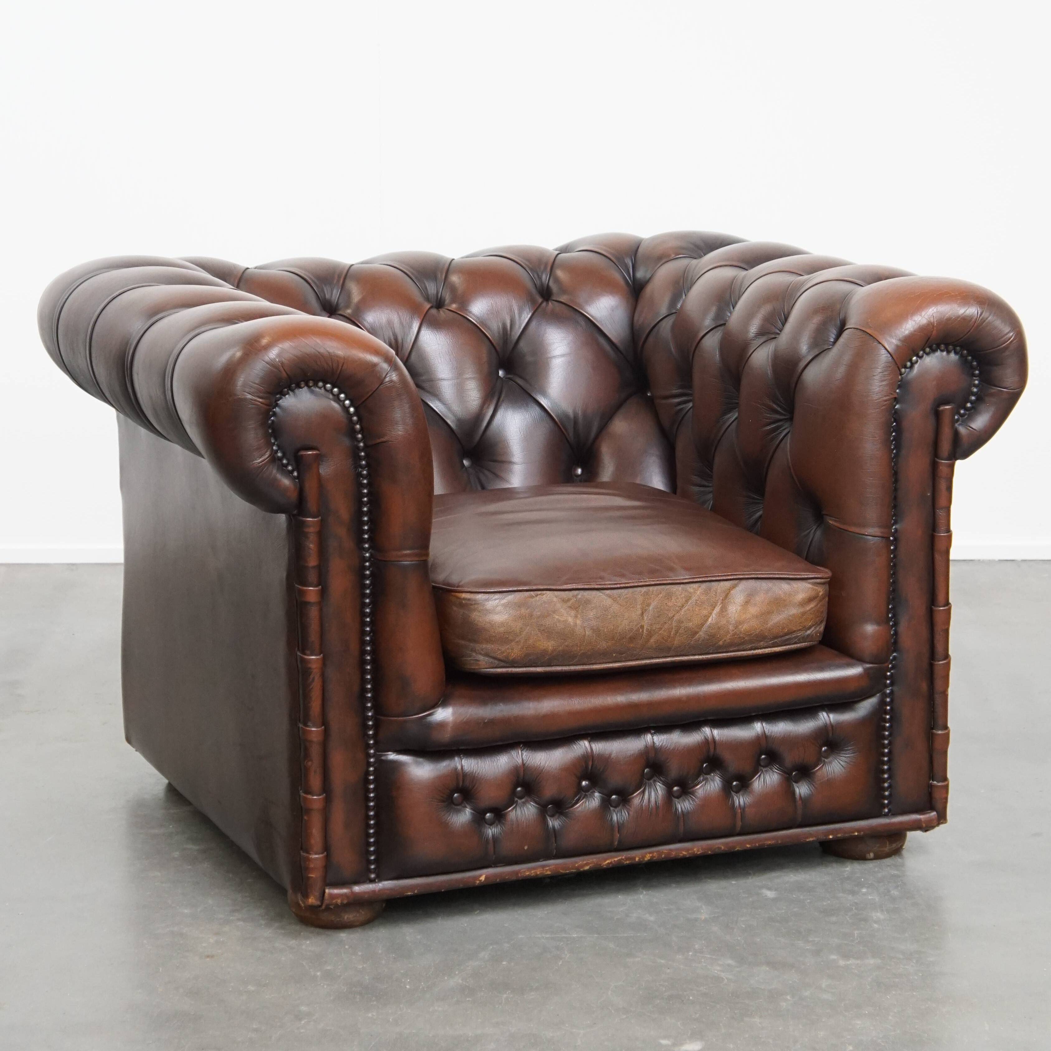 Dark brown English cowhide leather chesterfield armchair