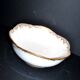 Antique Sèvres porcelain salad bowl with hand-painted gold arabesque decoration
