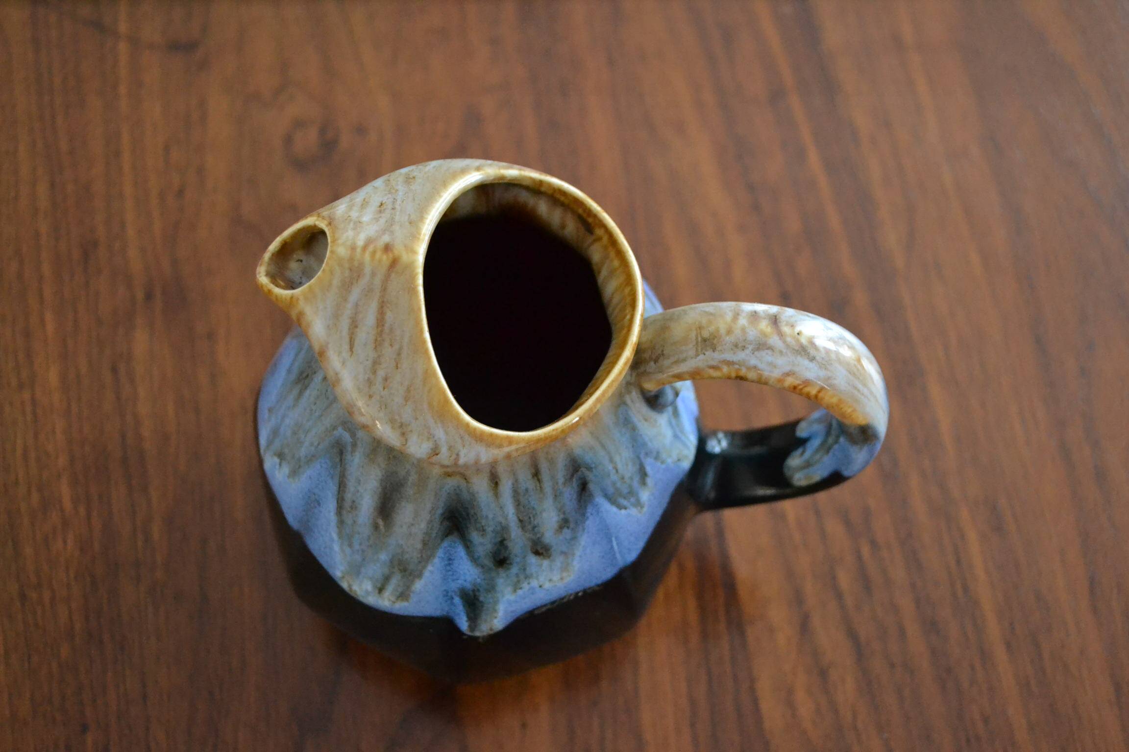 Blue flamed stoneware jug