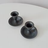 Pair of antique pewter candle holders