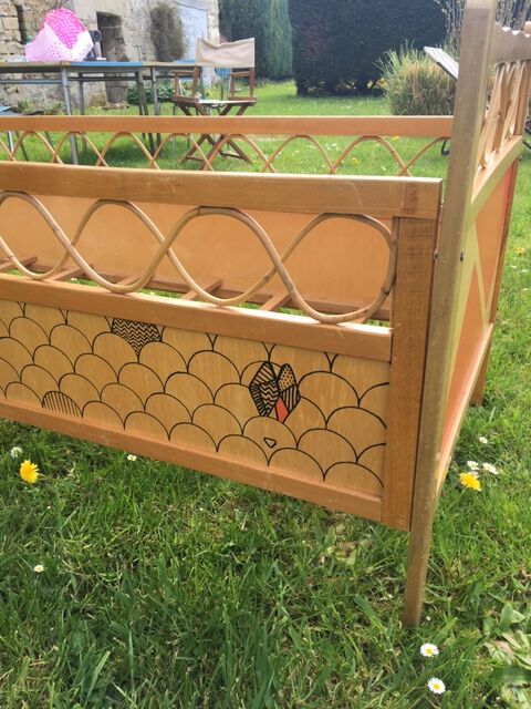Wood and rattan baby bed