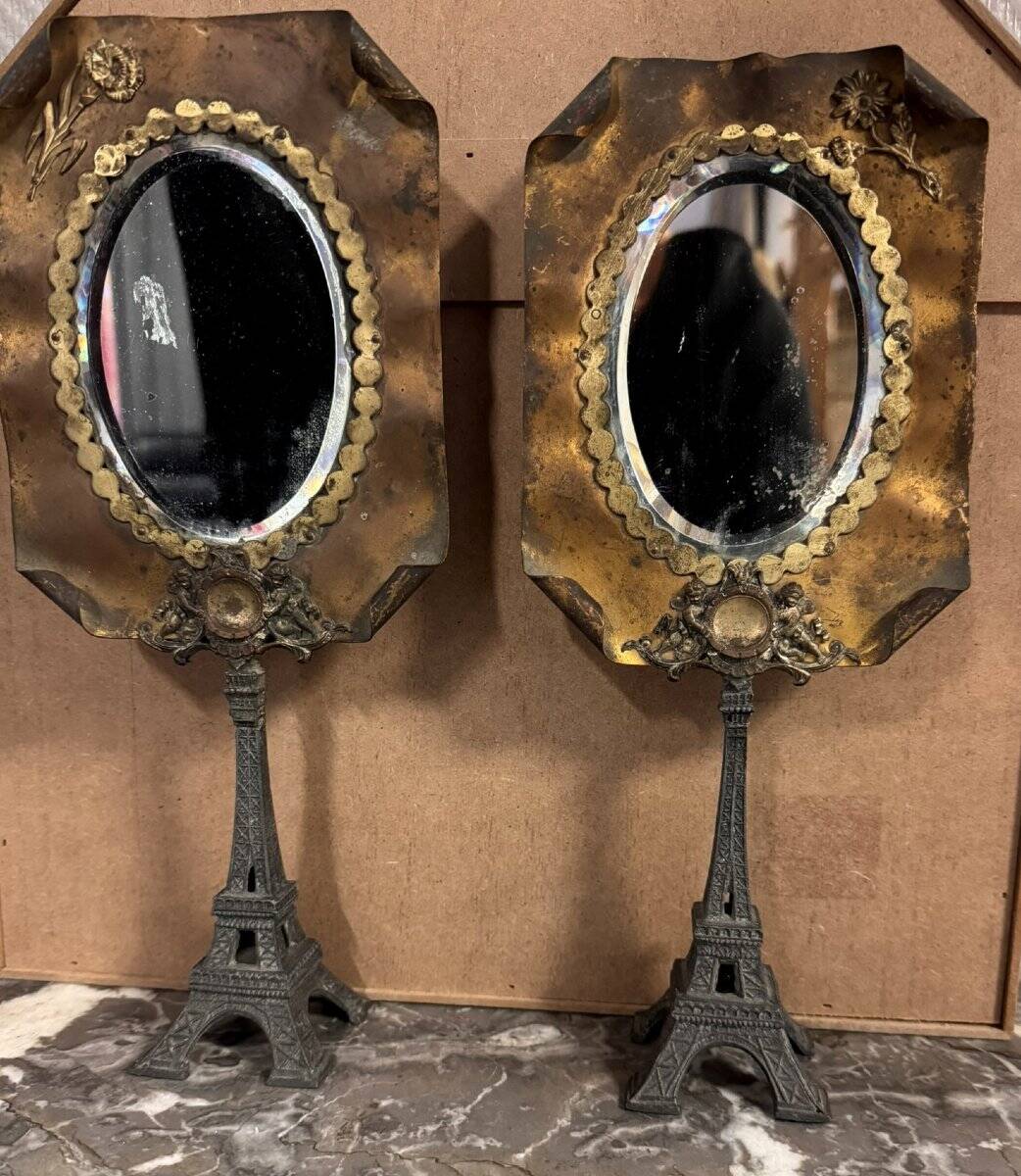 Pair of brass mirrors from the Art Deco period perched on the Eiffel Tower.