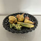 Large woven bowl and trompe l'œil fruits