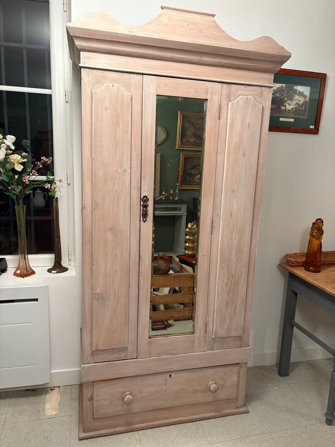 Antique English wardrobe in pale pink patina.