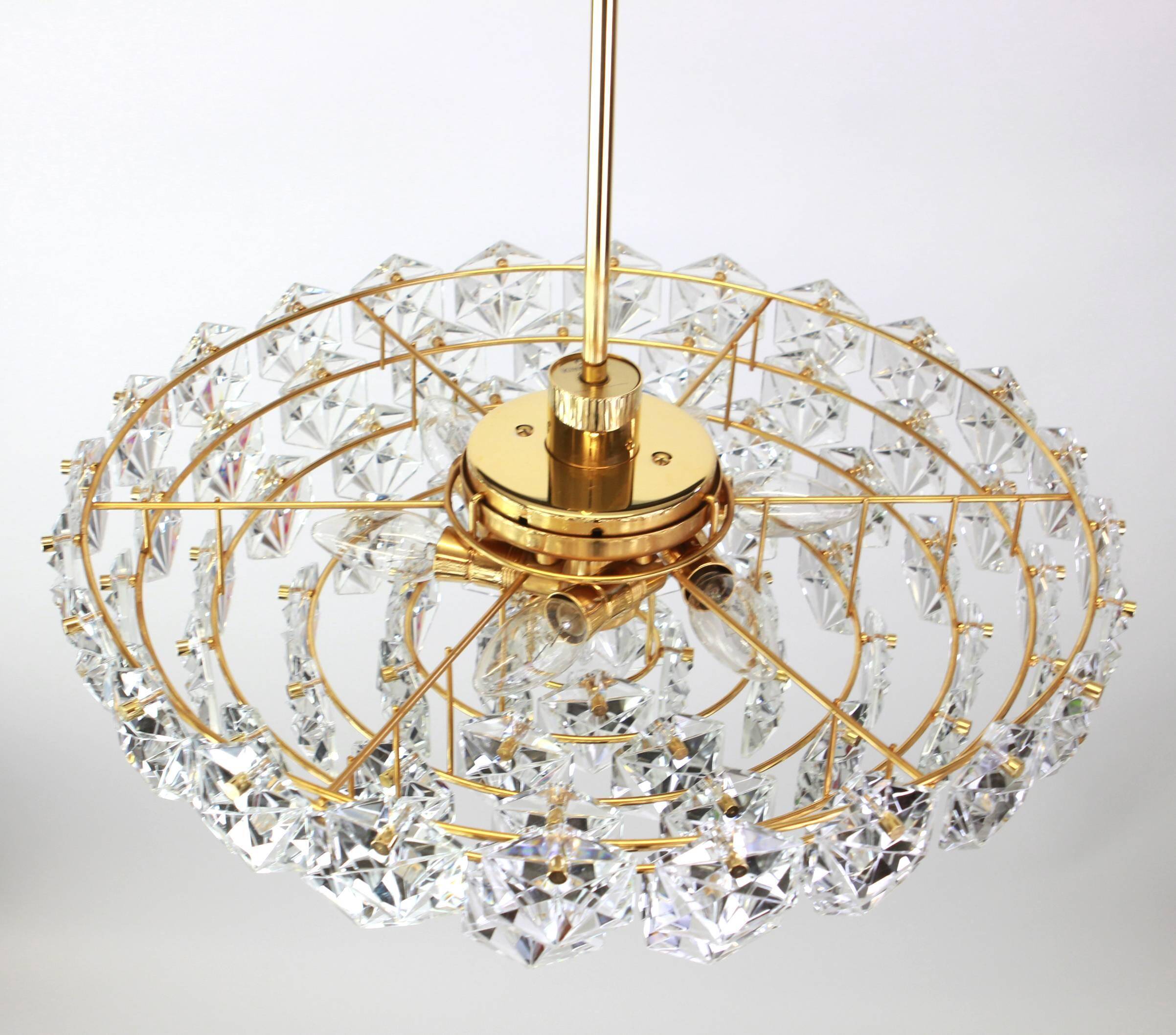 Impressive brass and crystal glass chandelier by Kinkeldey, Germany, 1970s.