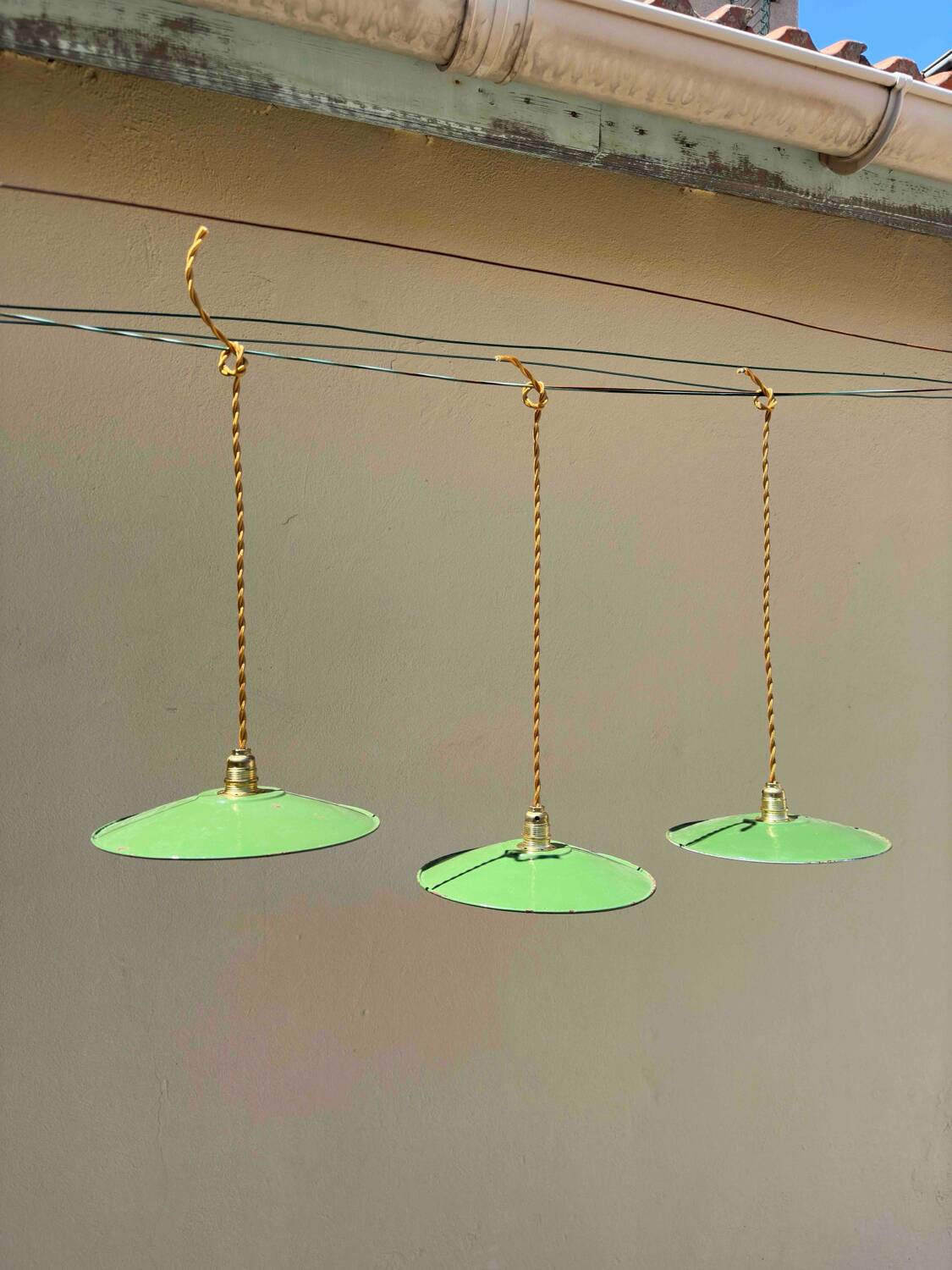 Lot of 3 vintage pendant lampshades in green and white enamelled sheet metal, industrial farm