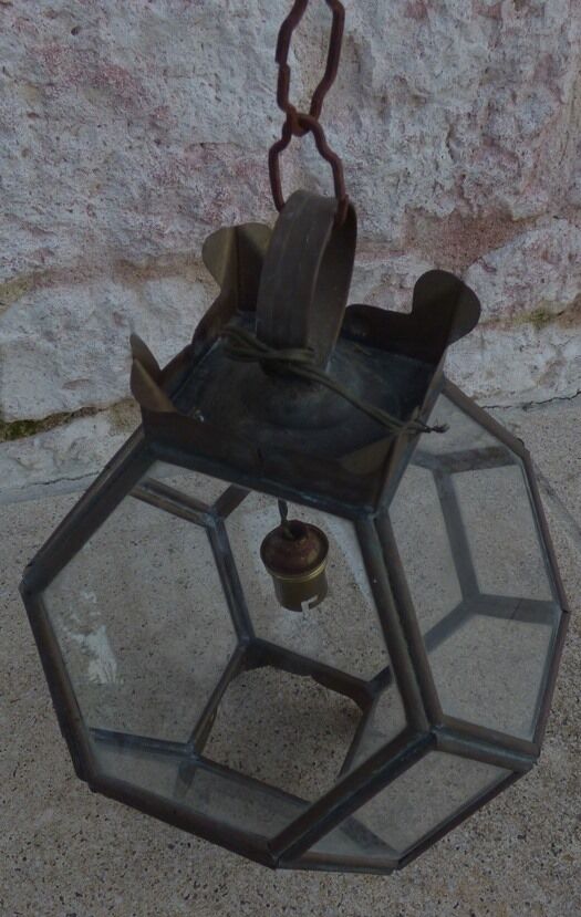 Old lantern in brass and glass with 8 facets or 24 stained glass windows