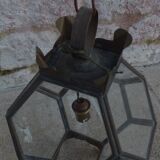 Old lantern in brass and glass with 8 facets or 24 stained glass windows