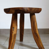 Brutalist stool made of olive wood