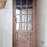 Old glass-fronted library in solid wood