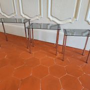 3 nesting tables from the 1970s in smoked glass.