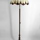 Bronze floor lamp with Tiffany-style stained glass shade – 20th century