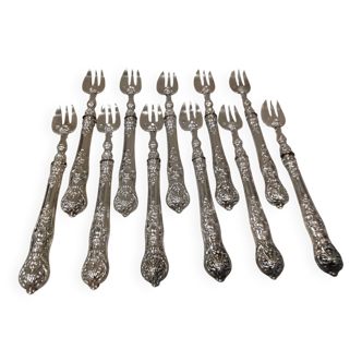 11 silver oyster forks, 800 Minerva style, Louis Philippe