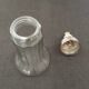 Glass sugar sprinkler and silver metal