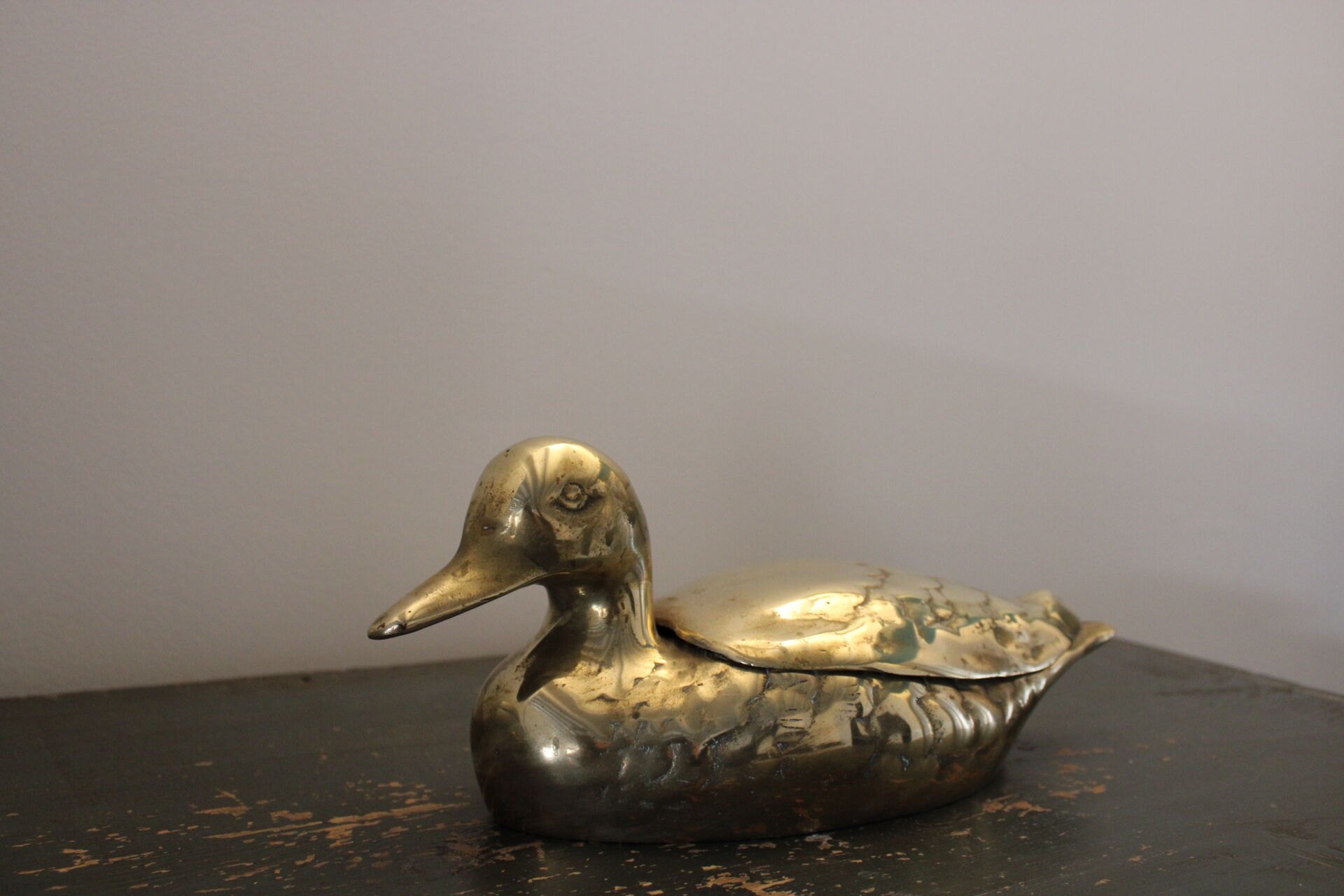 Empty pocket vintage brass duck