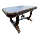 Art Deco table for 12 guests with extensions.