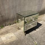 Chest of drawers with ornate mirrors