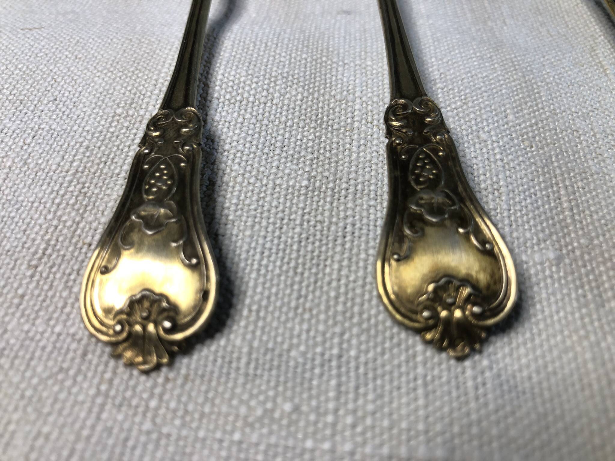Vermeil (gilded silver) spoons in black wooden box