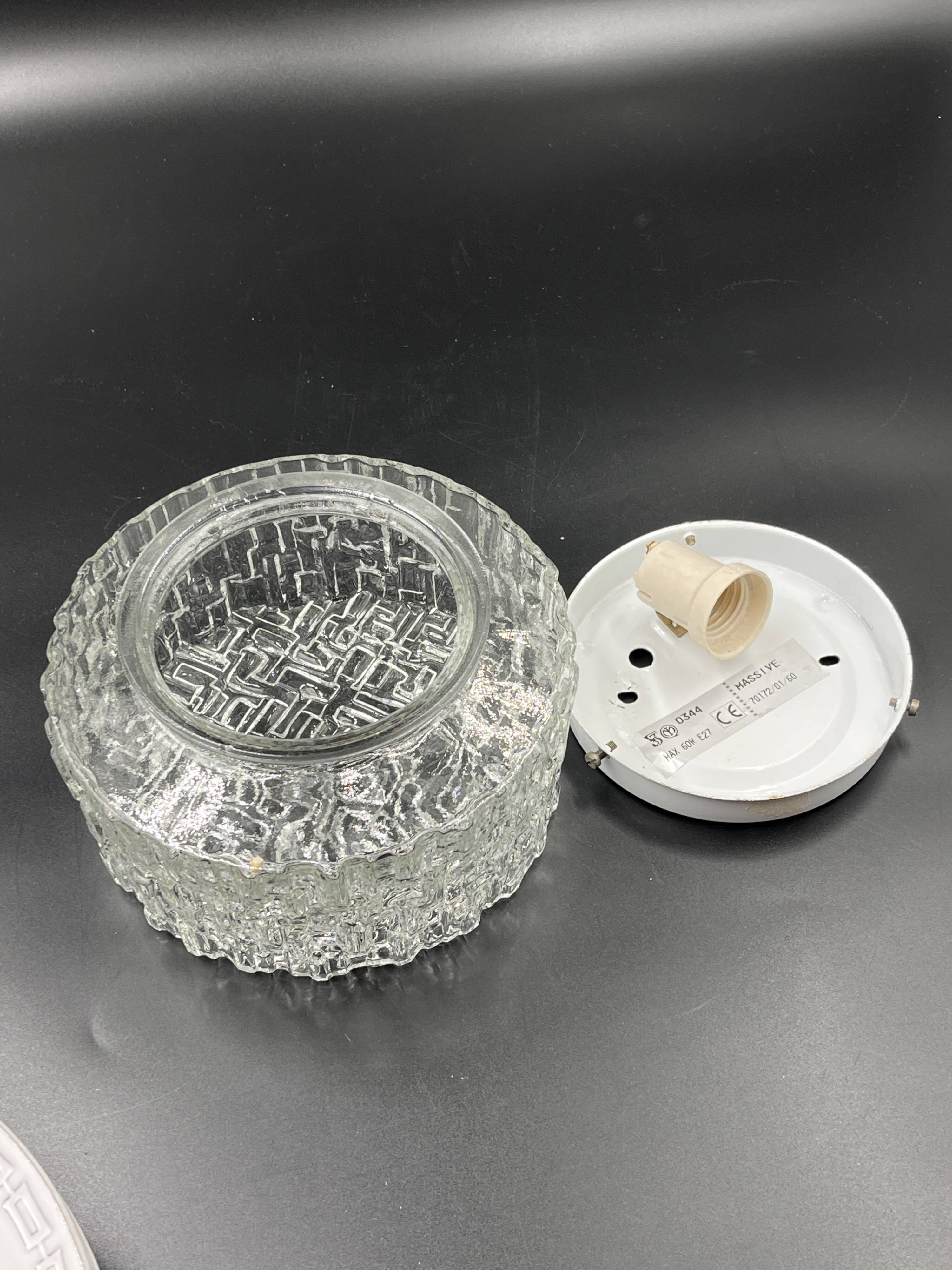 Molded glass ceiling light with relief