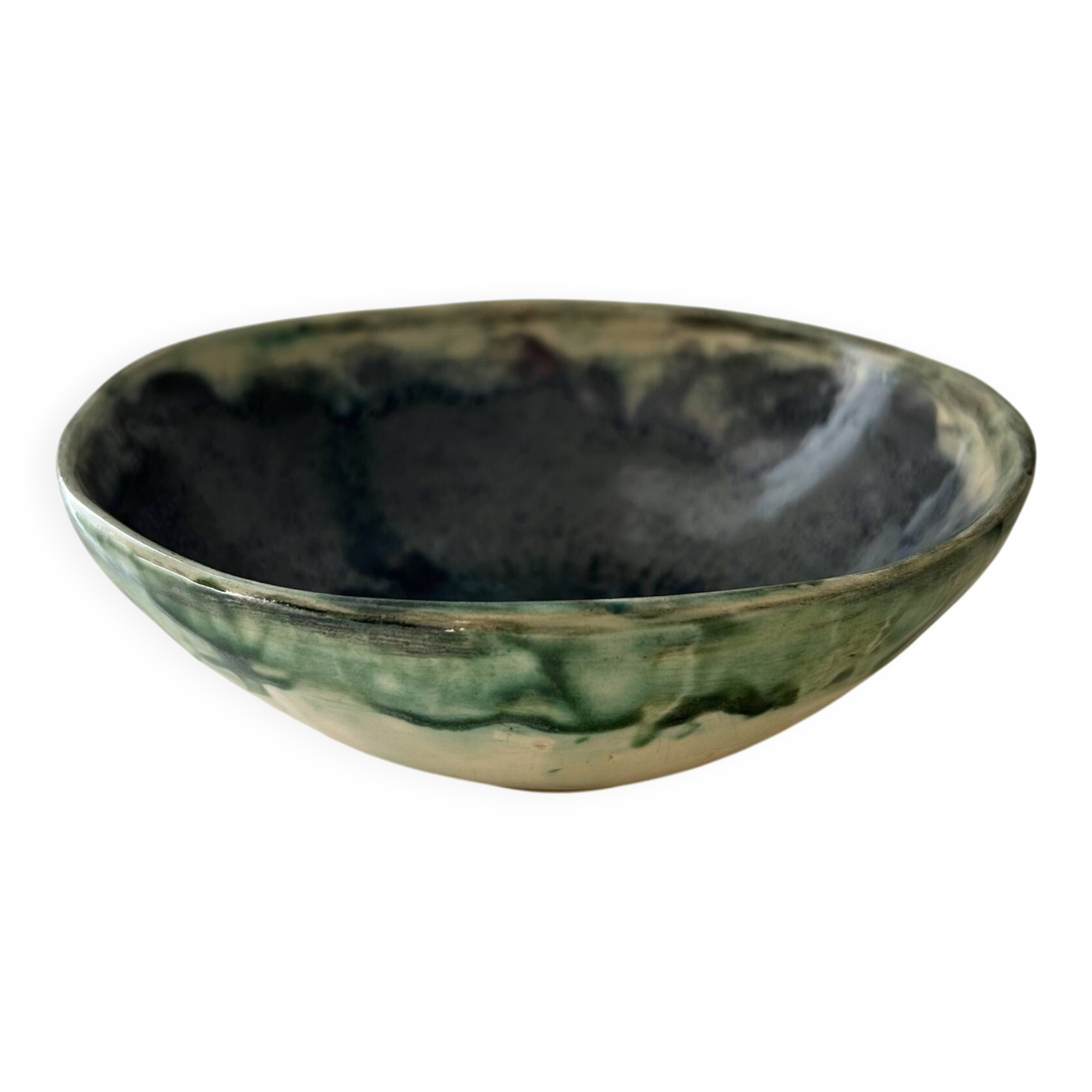 Green bowl signed with an eye