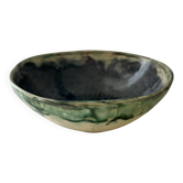 Green bowl signed with an eye
