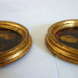 Set of 2 paintings in oval frames