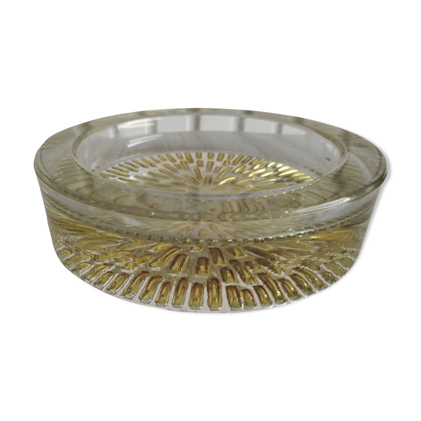 Empty round pockets of iridescent transparent glass of yellow sticks