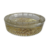 Empty round pockets of iridescent transparent glass of yellow sticks