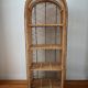 Rattan shelf on legs circa 1960